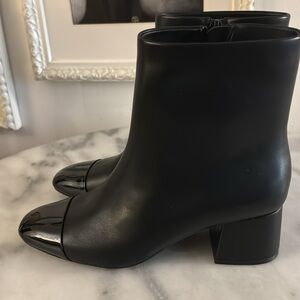 SOLD On 34th Street SZ 6 black shiny cap toe booties like CHANEL. synthetic.